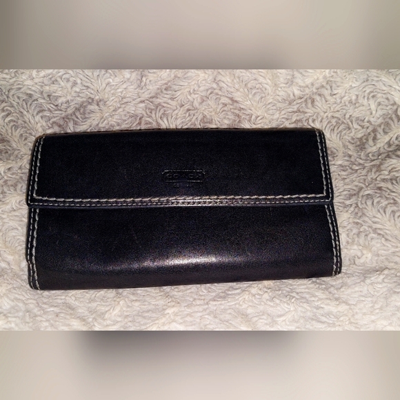 Coach Handbags - SOLD-Coach wallet with kiss lock closure Great condition and smoke free home.
